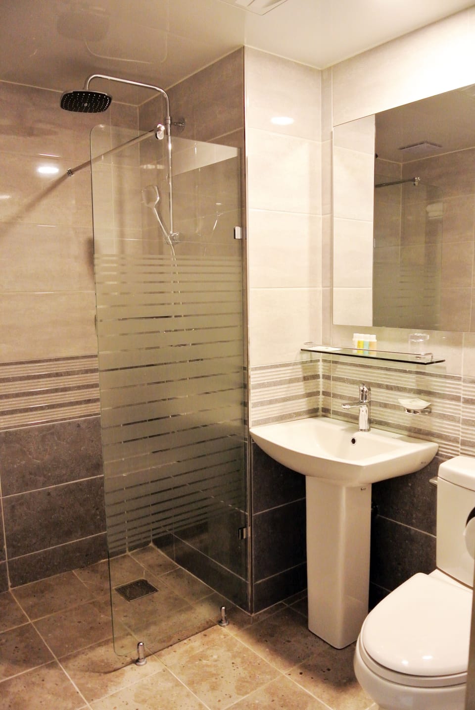 Shower, free toiletries, hair dryer, slippers