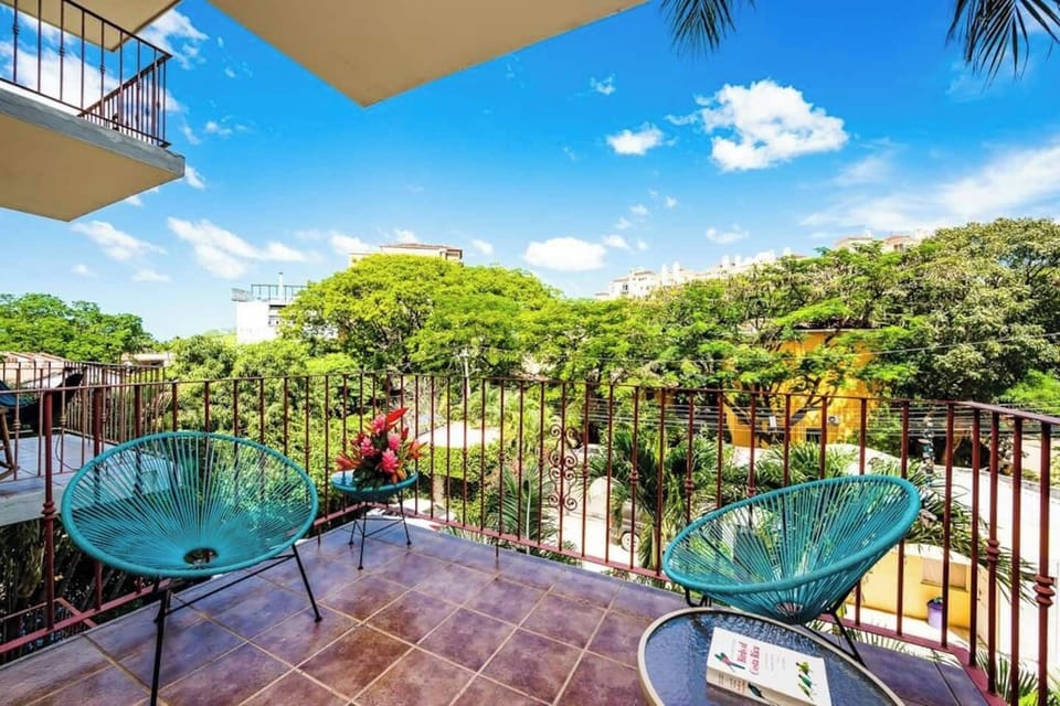 Step directly from your comfortable living room onto this welcoming terrace in the heart of Tamarindo. Easy access makes outdoor living effortless—bring drinks to sunset spot or morning coffee to fresh air. Indoor-outdoor living at its best.