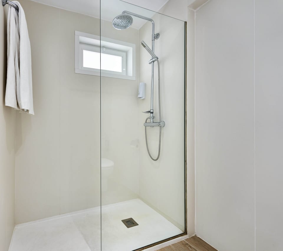 Shower, free toiletries, hair dryer, towels