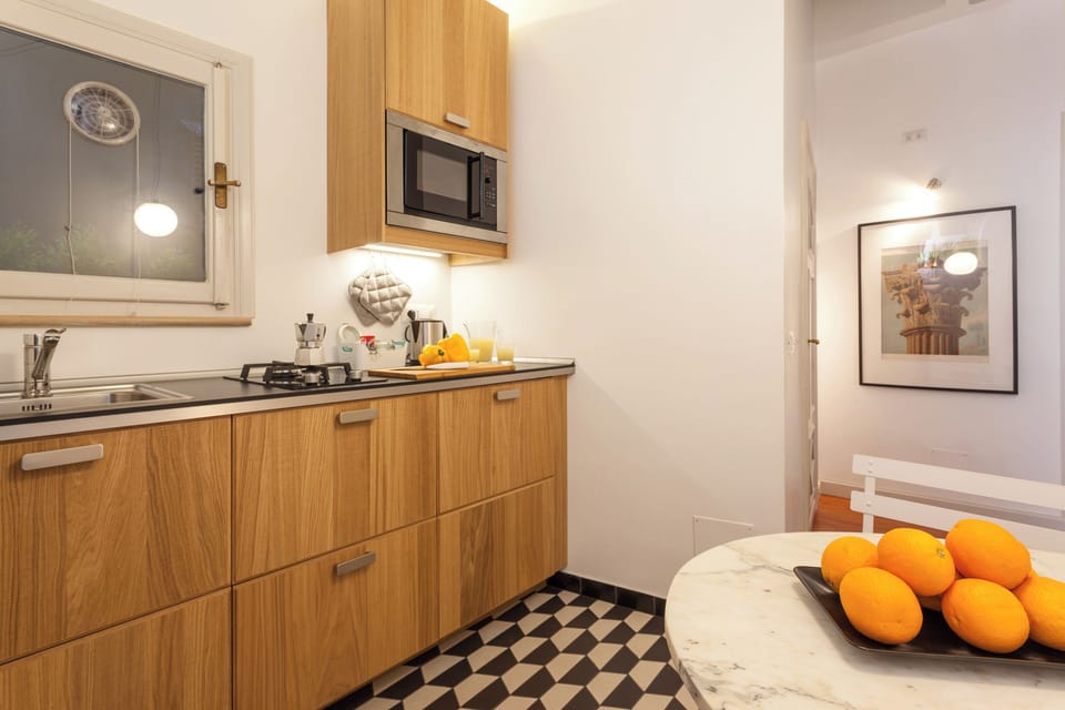 Design Suite, 1 Bedroom, Kitchen, City View | Private kitchen | Espresso maker, fridge