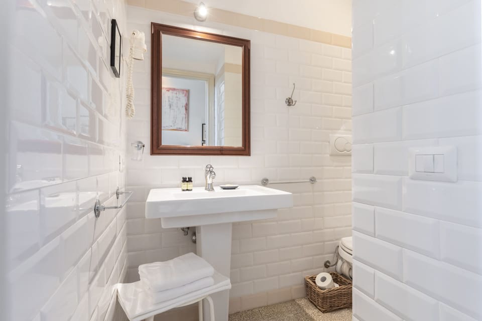 Shower, free toiletries, hair dryer, bathrobes
