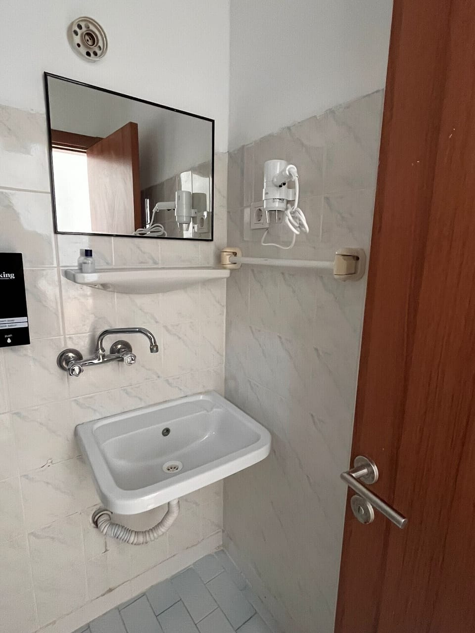 Shower, free toiletries, hair dryer, slippers