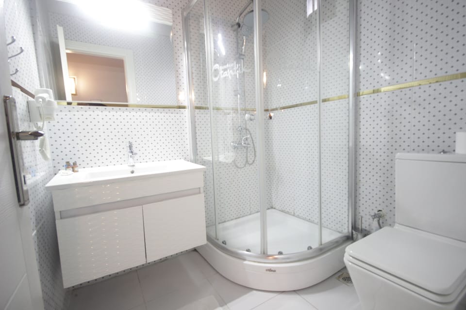 Shower, free toiletries, hair dryer, slippers