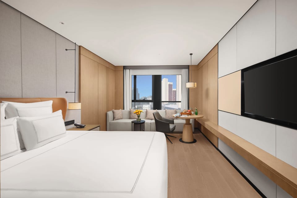 Premium bedding, down comforters, Select Comfort beds, minibar