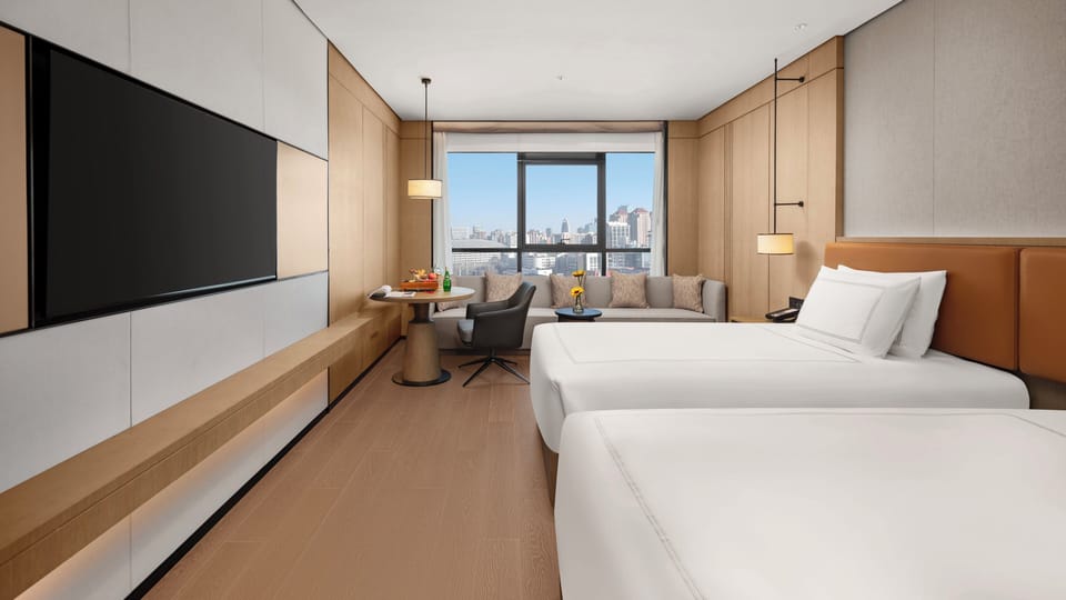 Premium bedding, down comforters, Select Comfort beds, minibar