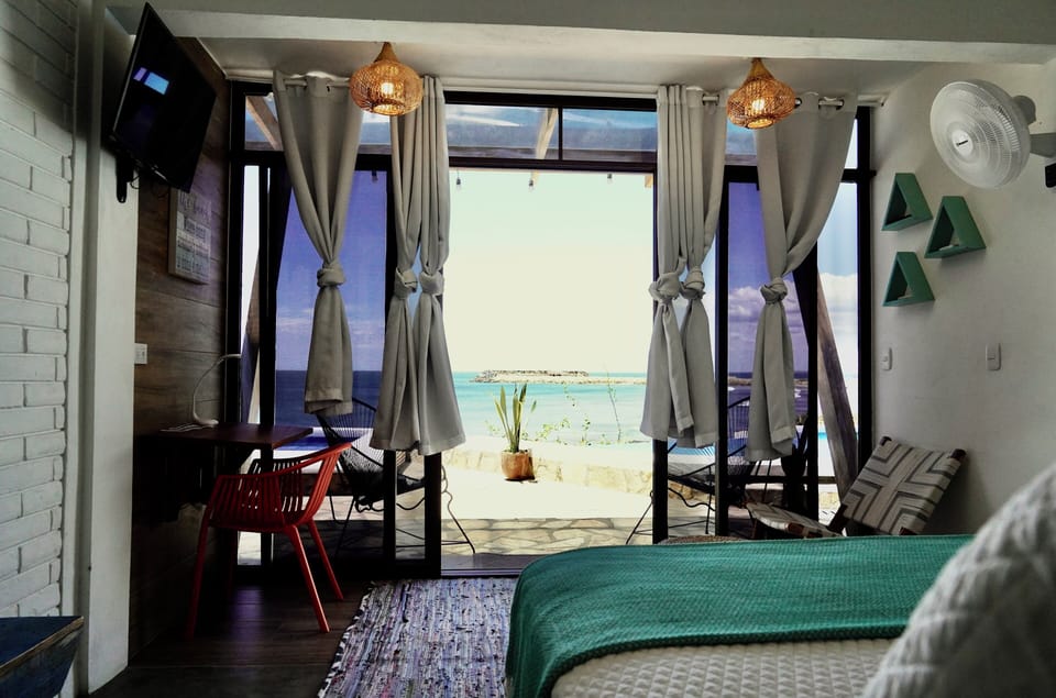 Deluxe Triple Room | Beach/ocean view