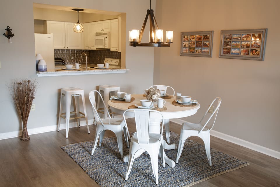 Gather the family around for a meal. This dining table now seats up to 8