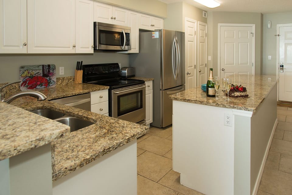 Well Stocked Upgraded Kitchen with Stainless Appliances and Granite Countertops