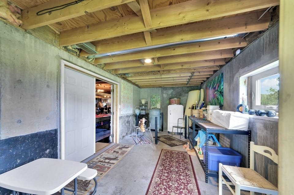 walk out lower level - game and outdoor storage 