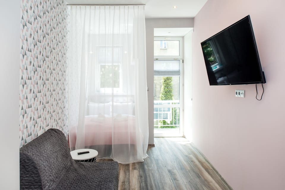 Comfort Double Room, 1 Double Bed with Sofa bed, Balcony, Park View | Living area | 40-inch flat-screen TV with satellite channels, TV