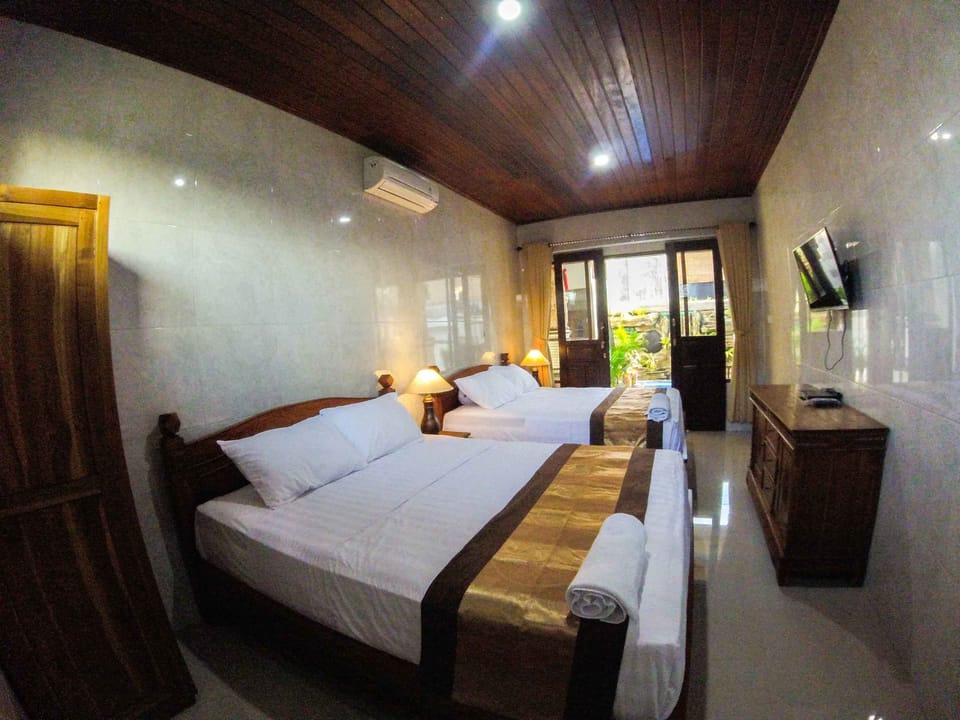 Family Room | Blackout drapes, free WiFi, bed sheets