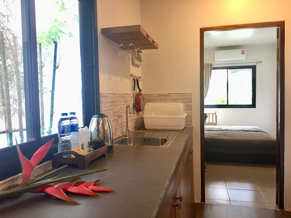 Family Quadruple Room, 2 Bedrooms | Private kitchenette | Fridge, microwave, stovetop, cookware/dishes/utensils