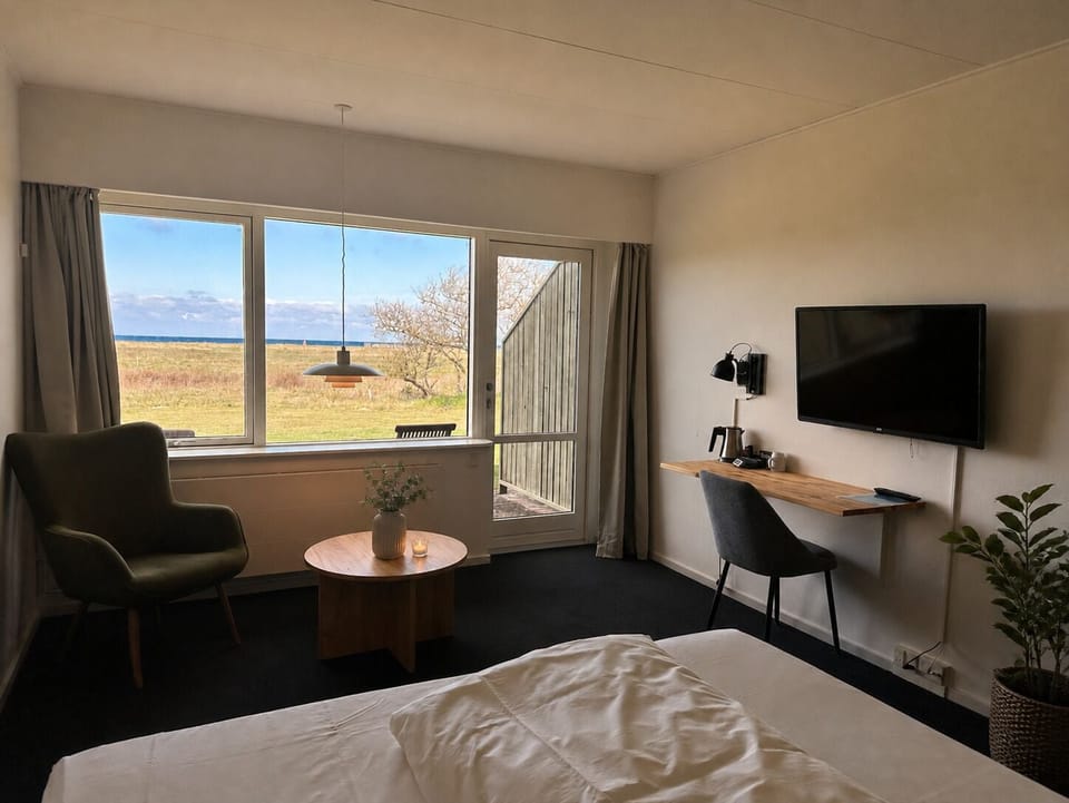 Double Room, Sea View | In-room safe, desk, cribs/infant beds, rollaway beds