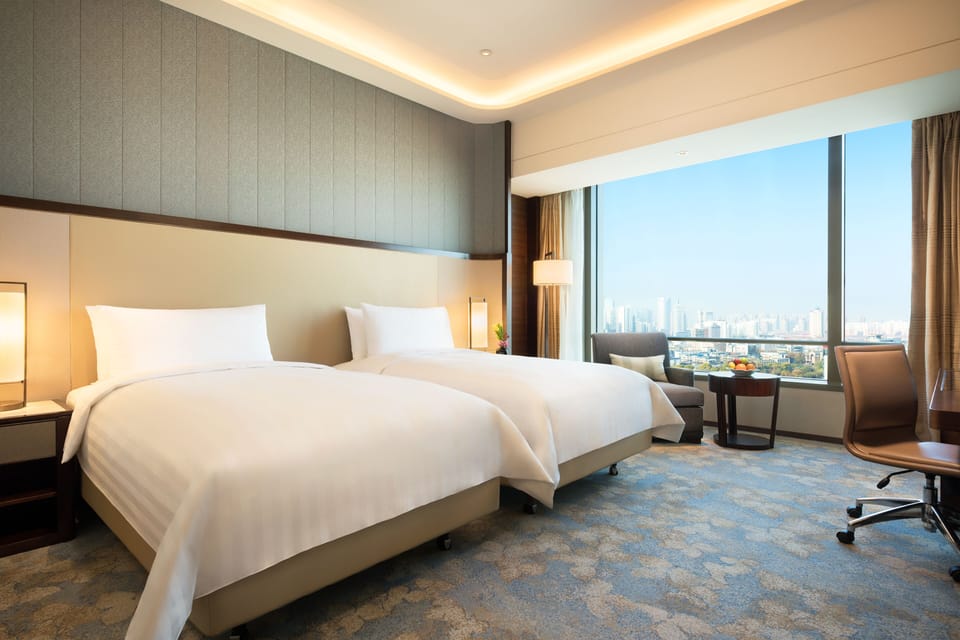Deluxe Room, 2 Twin Beds | Down comforters, minibar, in-room safe, desk