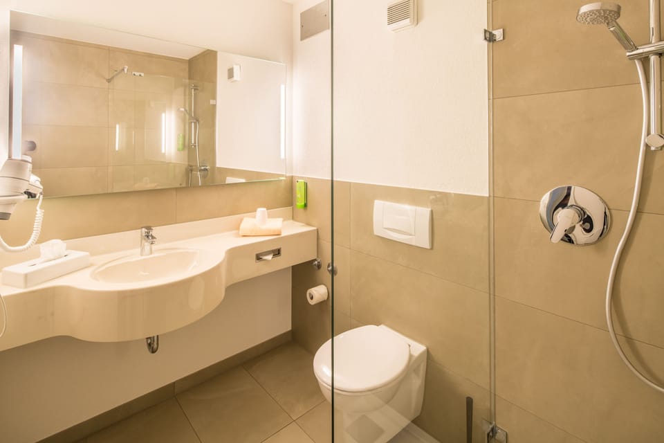 Shower, free toiletries, hair dryer, towels