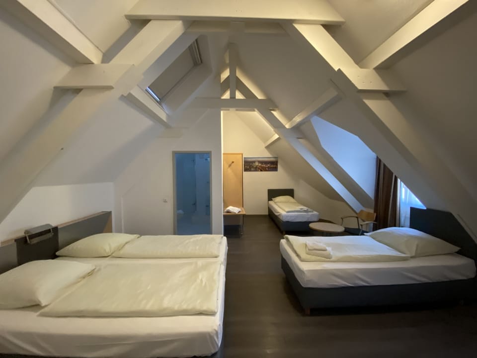 Quadruple Room | In-room safe, desk, soundproofing, iron/ironing board