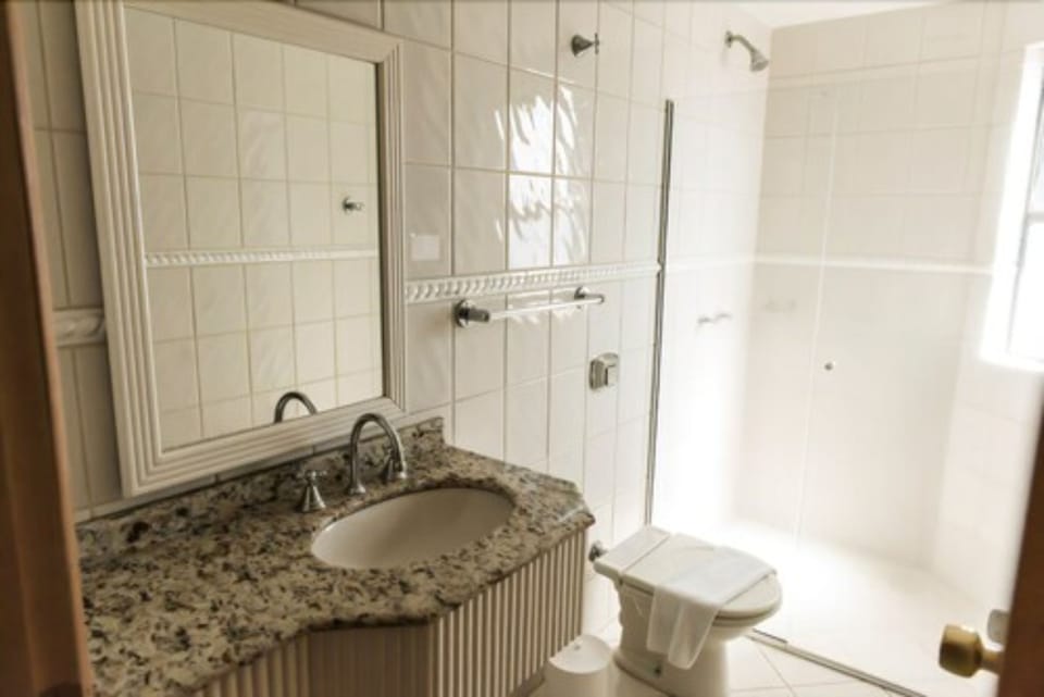 Luxury Triple Room, Multiple Beds | Bathroom | Shower, free toiletries, hair dryer, towels