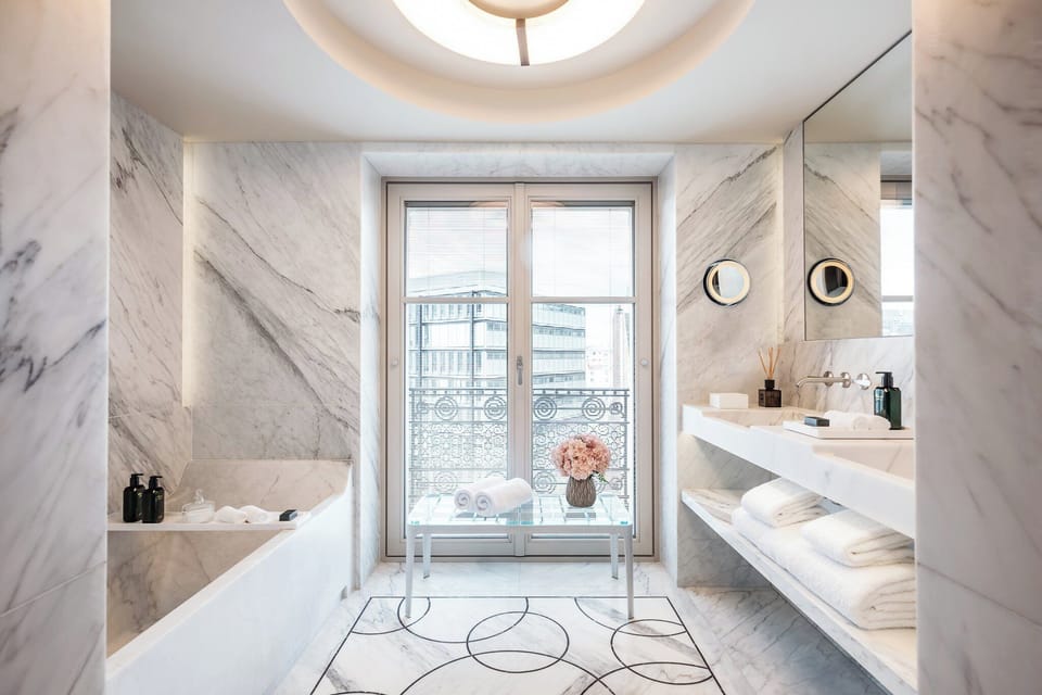 Haute Couture Suite by Isabelle Huppert | Bathroom | Shower, rainfall showerhead, designer toiletries, hair dryer