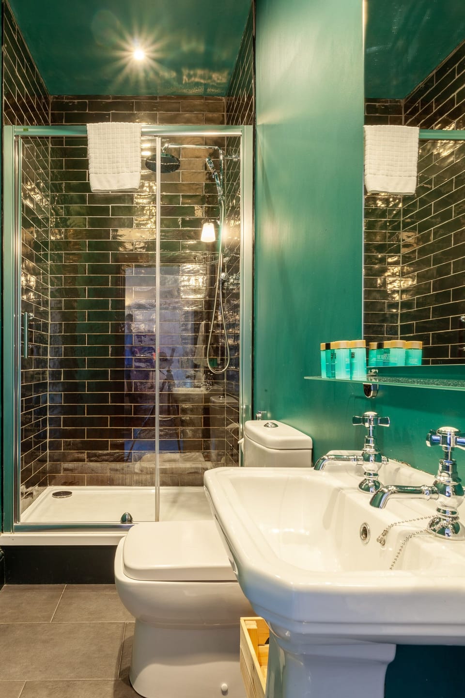 Shower, rainfall showerhead, designer toiletries, hair dryer