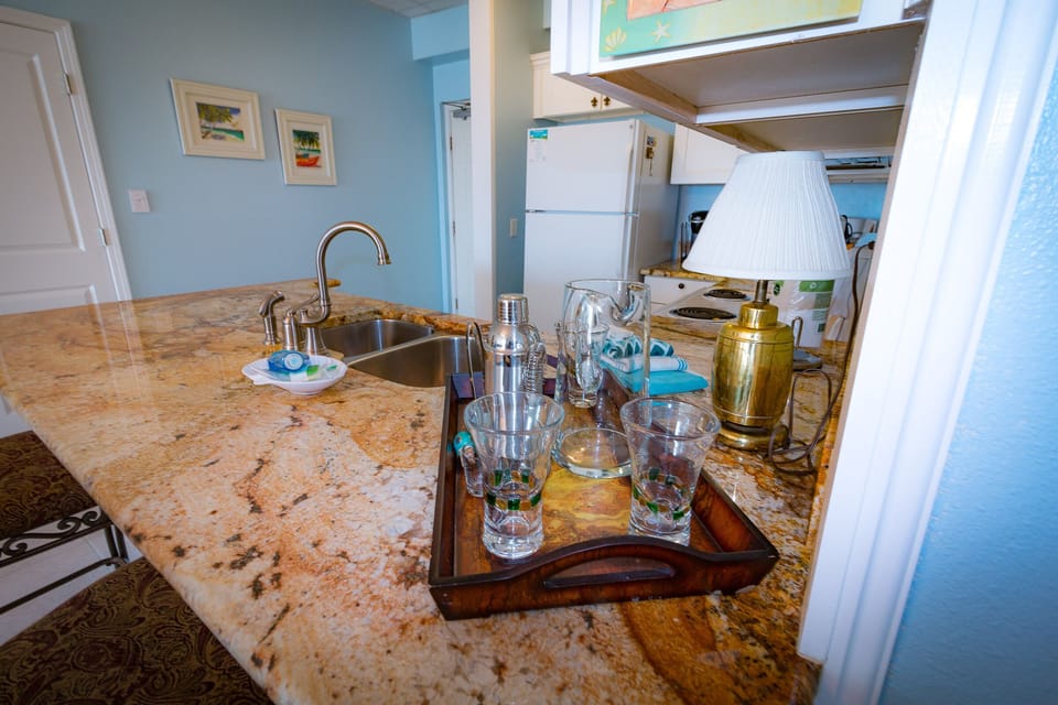Granite counter tops with seating for 2 at the bar