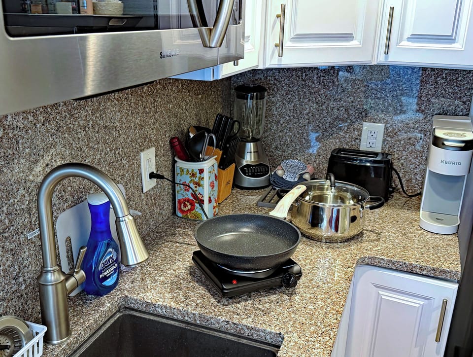 Electric hot-plate is used for cooking with our frying pans & 5-quart Spaghetti.