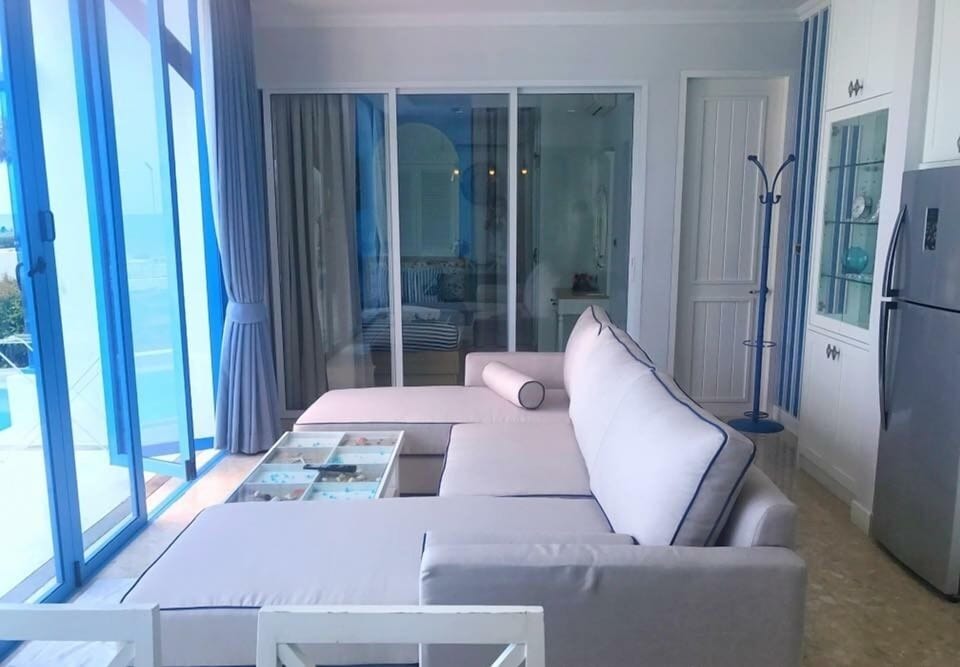 Private Beach Front Pool Villa | Living area | 49-inch flat-screen TV with cable channels, TV