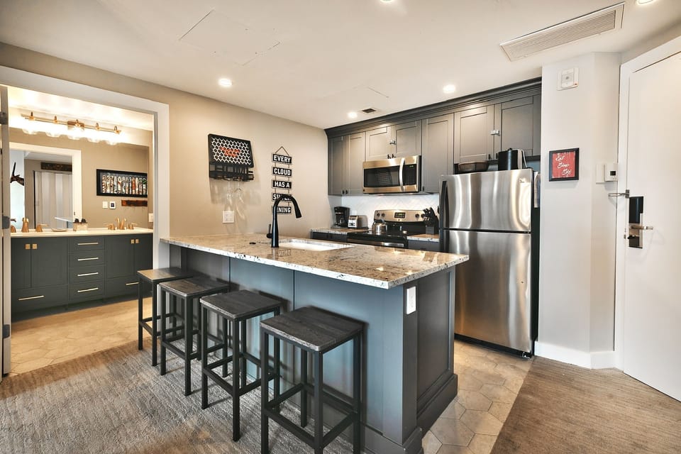 Condo, 2 Bedrooms | Private kitchen | Full-size fridge, microwave, oven, stovetop