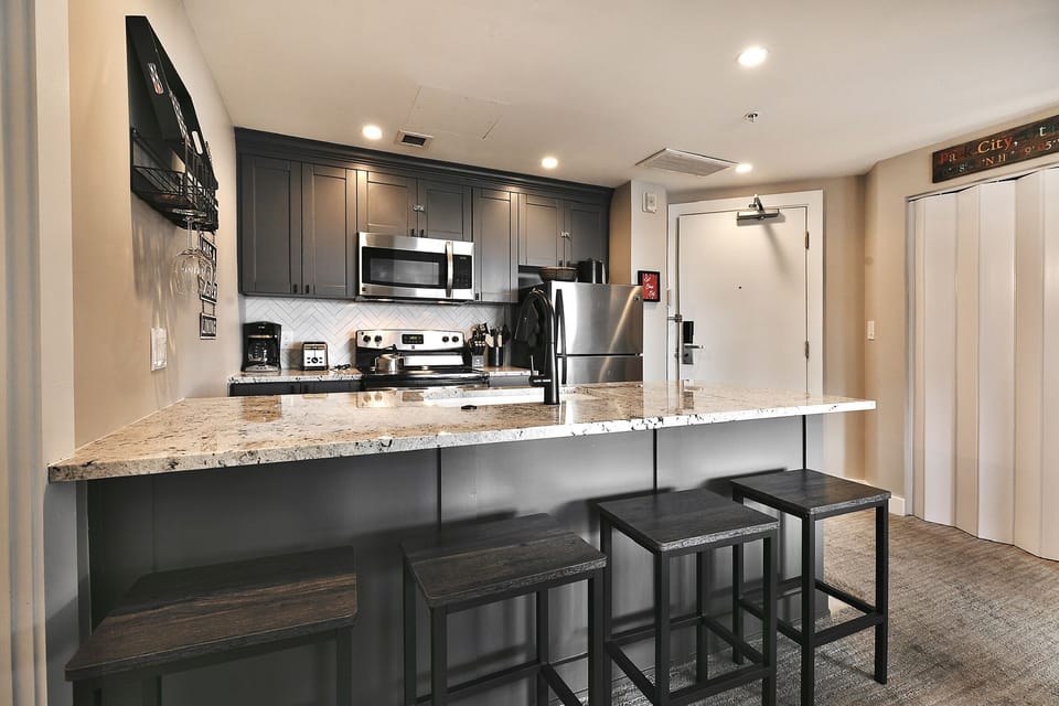 Condo, 2 Bedrooms | Private kitchen | Full-size fridge, microwave, oven, stovetop
