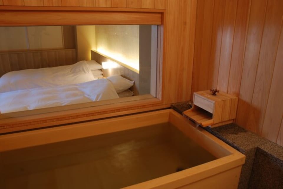 Separate tub and shower, free toiletries, hair dryer, slippers