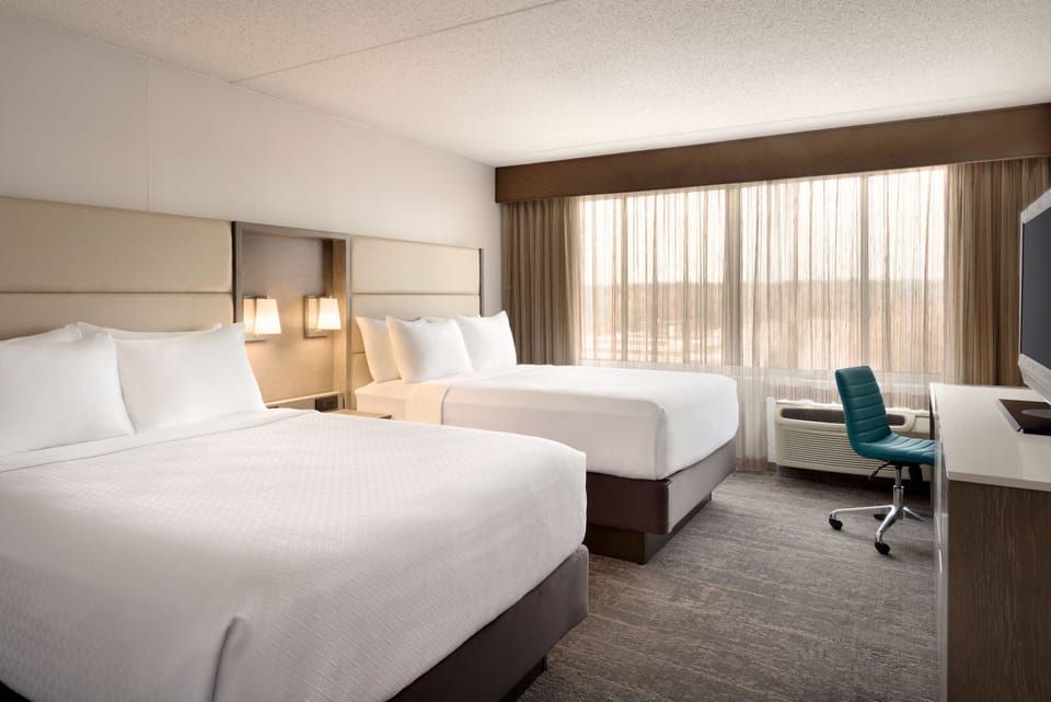 Standard Room, 2 Double Beds | In-room safe, desk, iron/ironing board, free cribs/infant beds