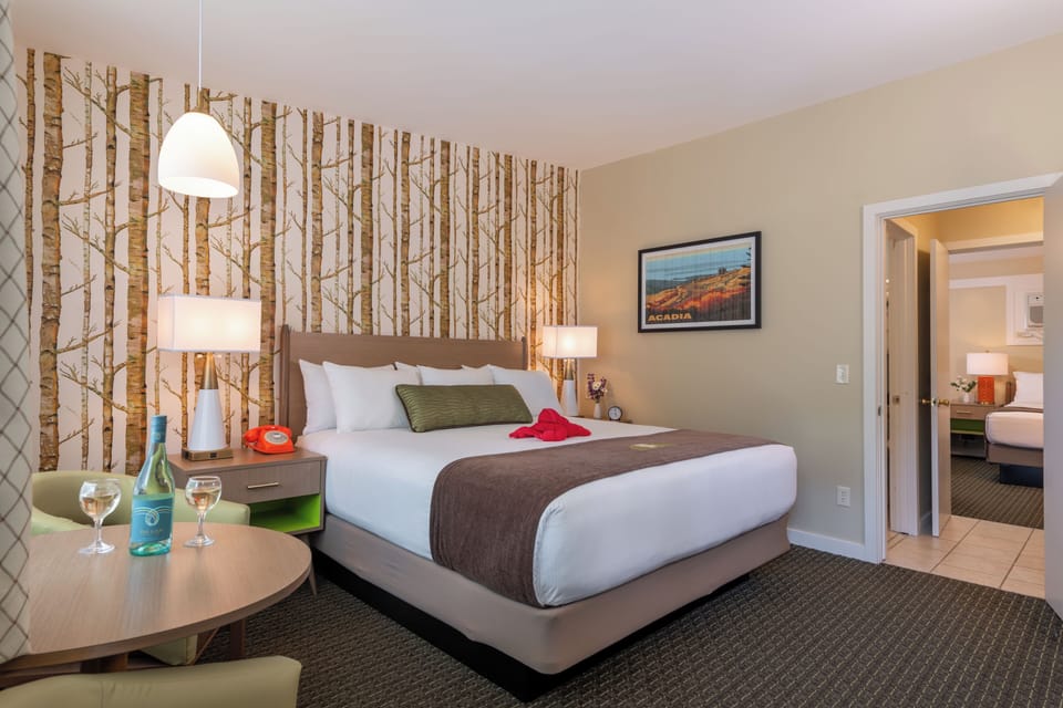 Family Room, 2 Bedrooms | Desk, iron/ironing board, free cribs/infant beds, free rollaway beds