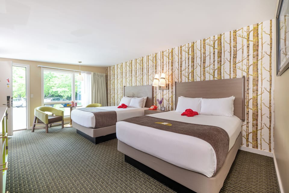 Room, 2 Queen Beds | Desk, iron/ironing board, free cribs/infant beds, free rollaway beds
