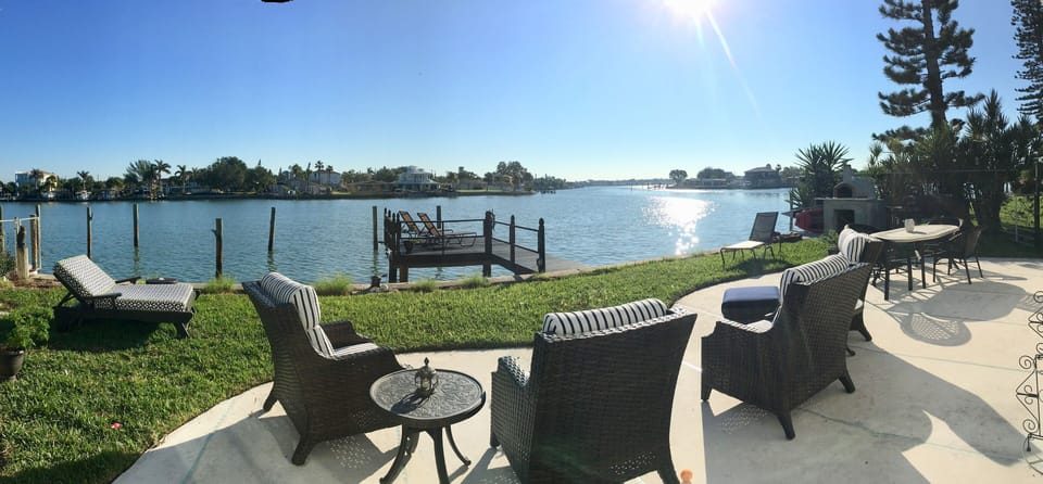 Private backyard with BBQ, dining table and plenty of room to comfortably lounge