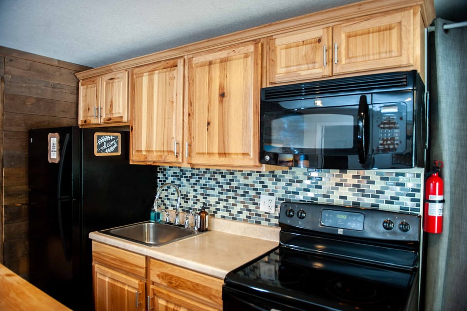 Fully stocked with dishes, pots, pans, spices, etc. All you could ever need!