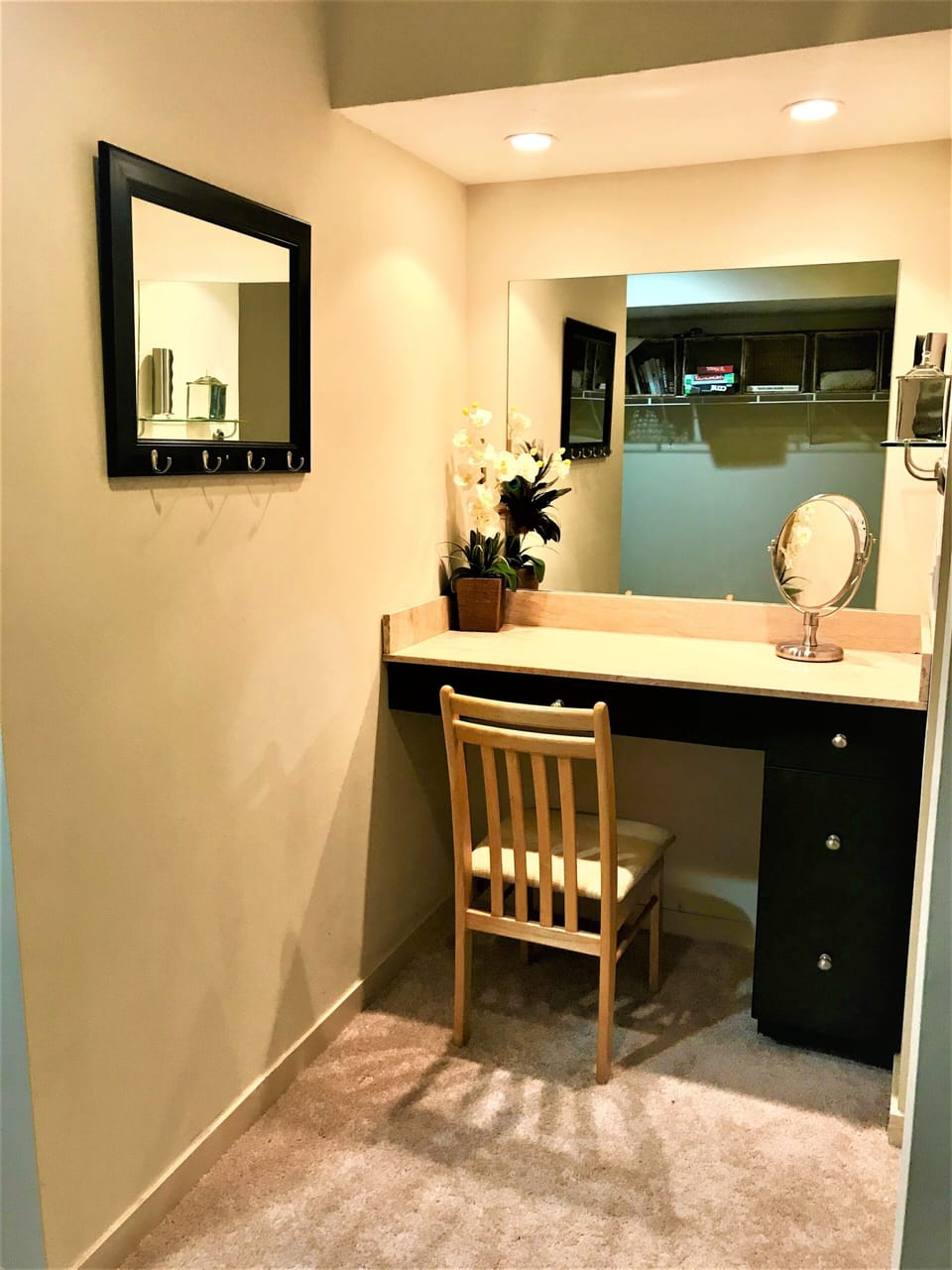 Powder room with granite vanity in a huge walk-ins closets