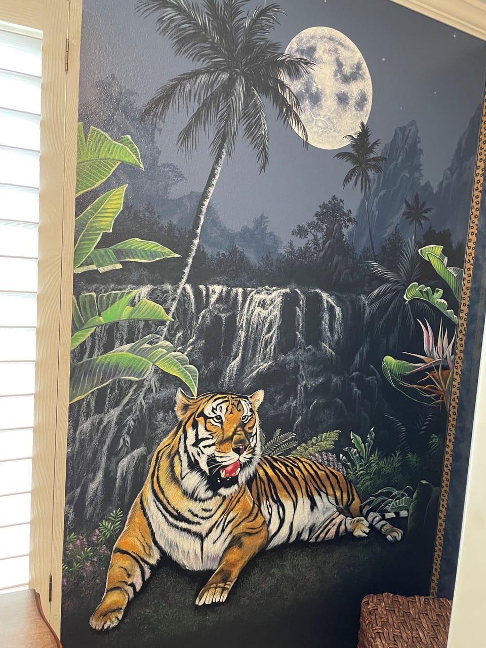Tiger mural...and all artwork throughout the home has been painted by the owner.