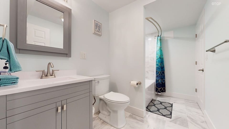 Brand new Luxury Bathroom with marble tile on lower level
