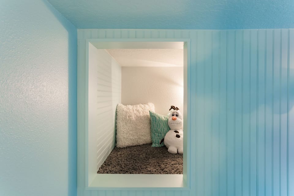 On the top bunk you can crawl over into your own secret den where the kids can play