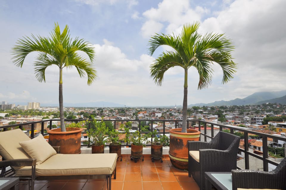 Terrace with ocean and city view