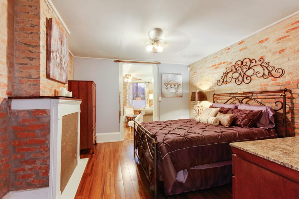 View from the kitchen door to the bedroom & living room. Ceiling fan here  too.