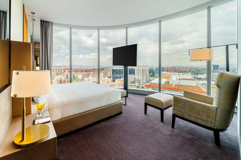 Suite, Corner | Premium bedding, down comforters, free minibar items, in-room safe