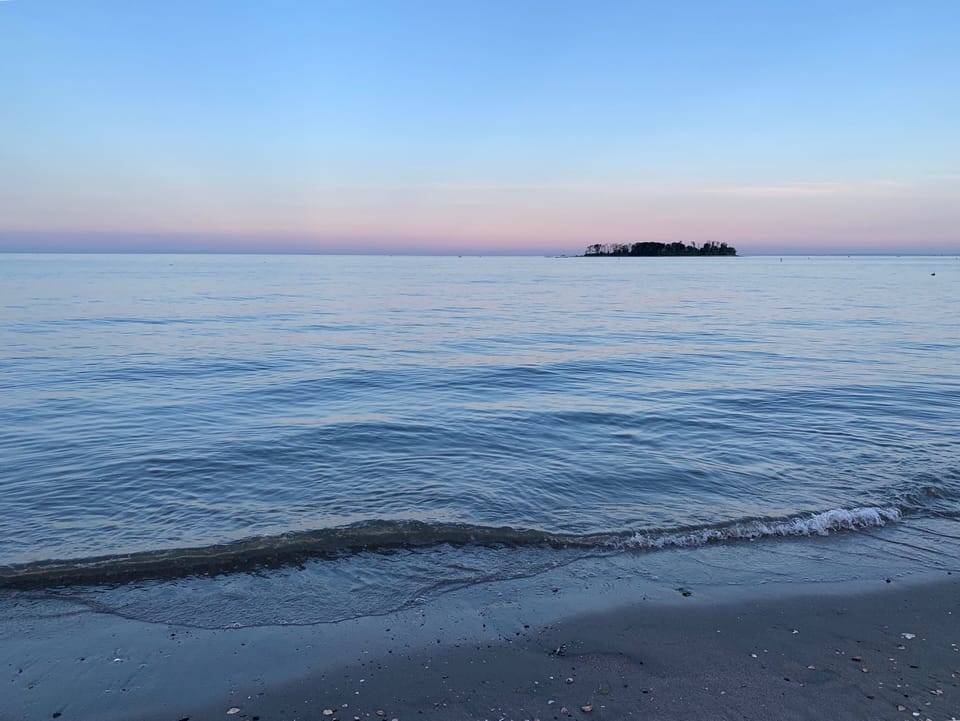 How peaceful and beautiful - dusk by the beach right across the street!