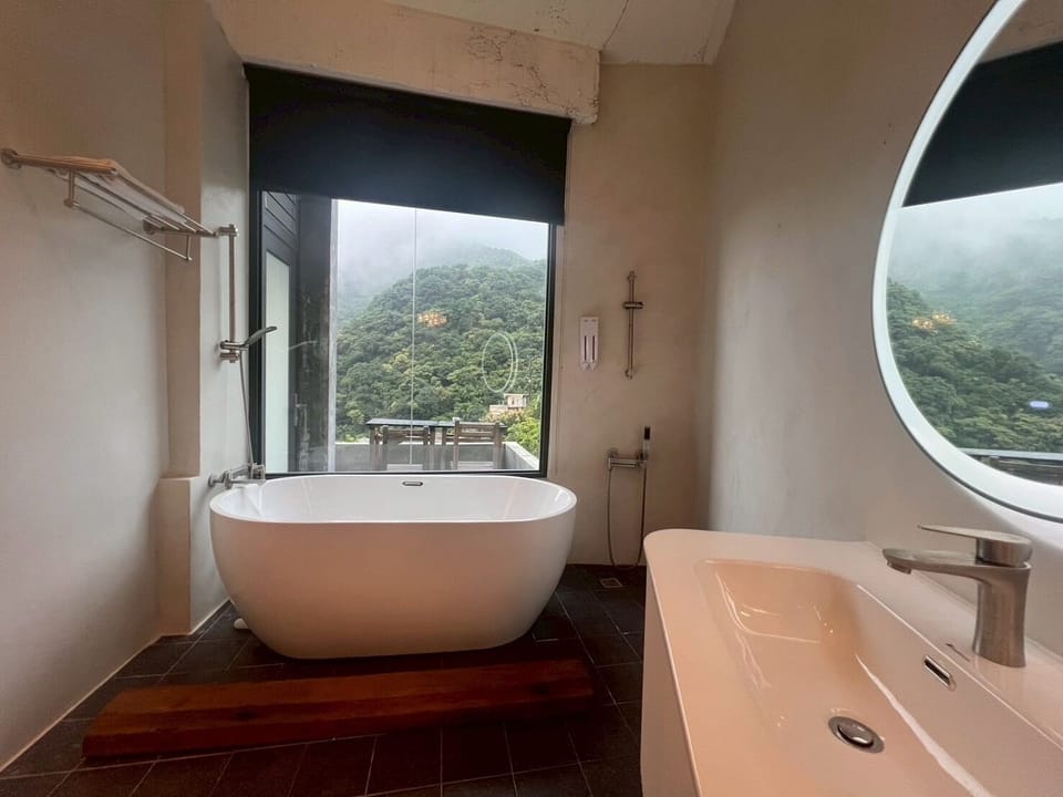 Luxury Double Room, Patio, Mountain View | Bathroom | Hair dryer, slippers, towels
