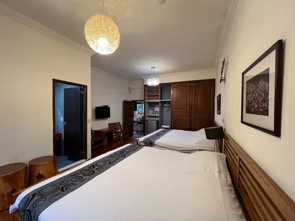 Family Quadruple Room, 2 Queen Beds | 1 bedroom, premium bedding, down comforters, Select Comfort beds