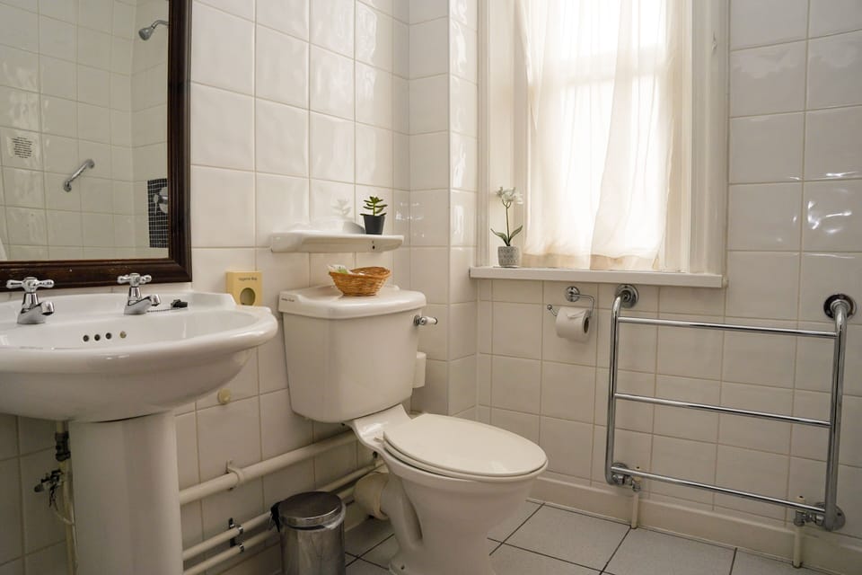 Shower, free toiletries, slippers, towels