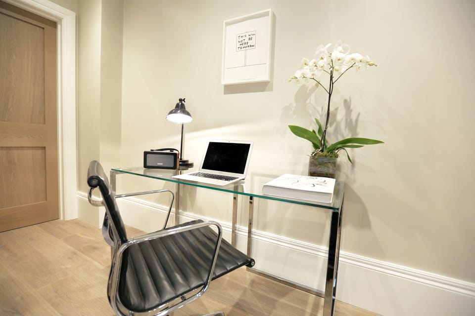 Premium Apartment, 1 King Bed | Living area | 42-inch flat-screen TV with satellite channels, TV, fireplace