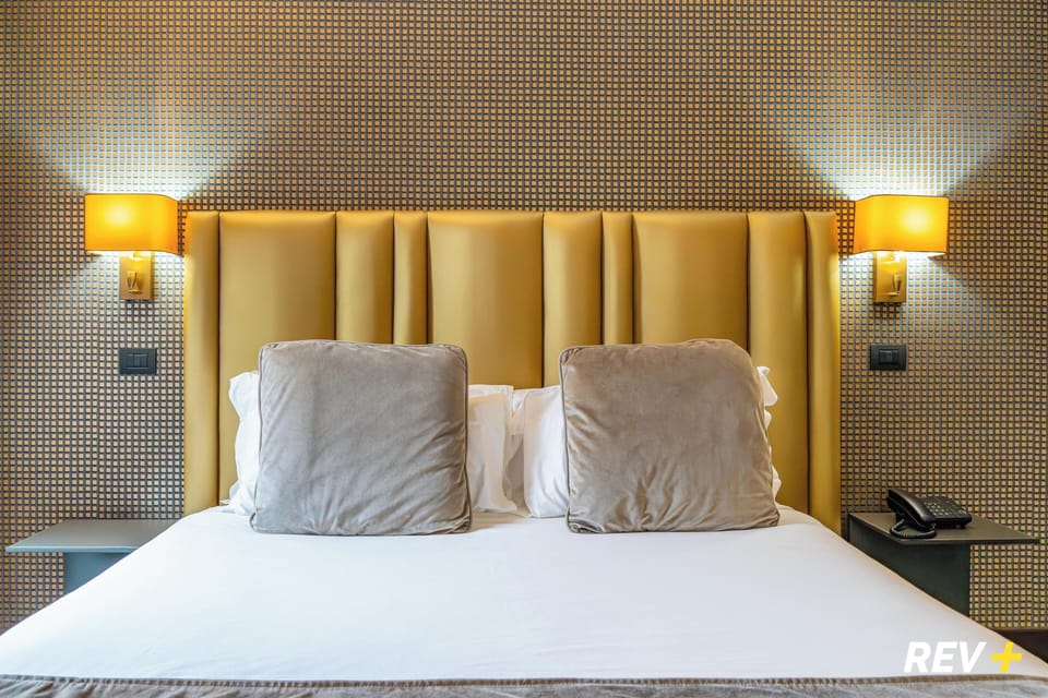 Premium bedding, down comforters, in-room safe, desk