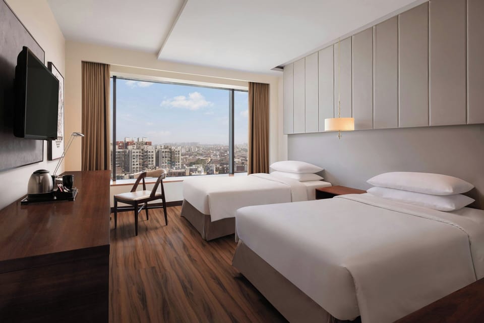 Pillowtop beds, minibar, in-room safe, desk