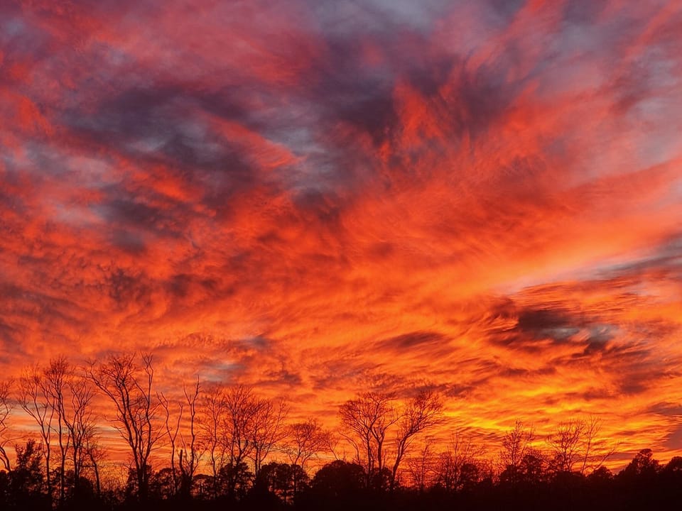 Popular sunset from balcony by guest.