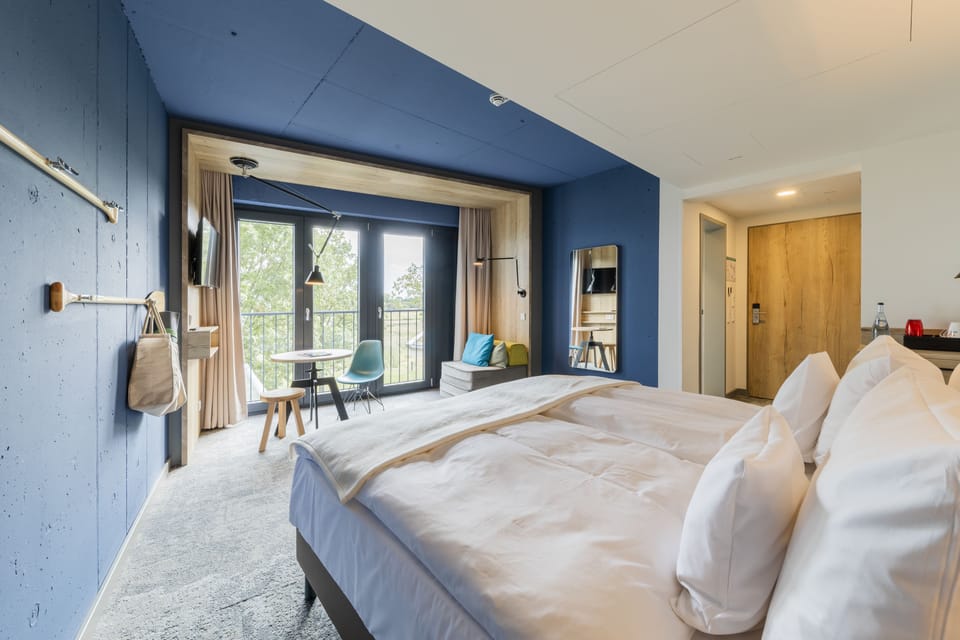 Premium bedding, down comforters, in-room safe, desk